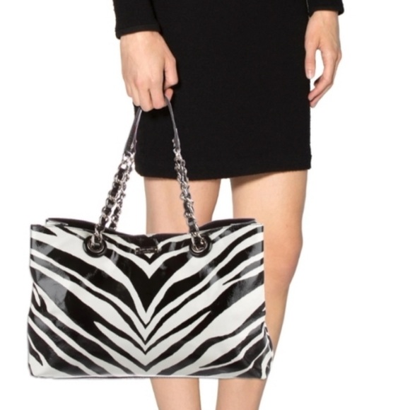 kate spade Handbags - Kate Spade Pastiche Helena zebra bag, red interior